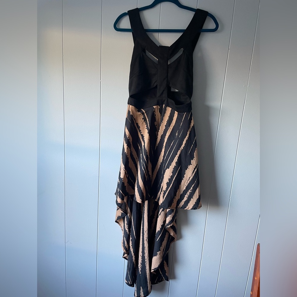 Women’s dress, Urban Outfitters, cut out top, high low, size Large
Reverse